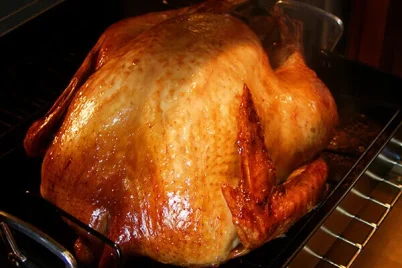 How To Know A Turkey Whole turkey in an oven.