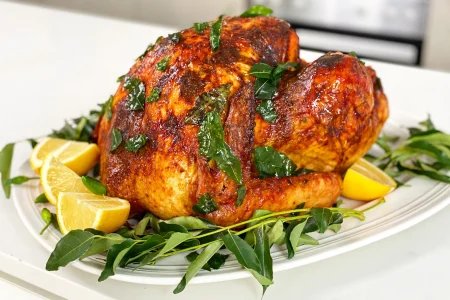 123-min-scaled Turkey 65 garnished with oil tempering with a side of lemon.