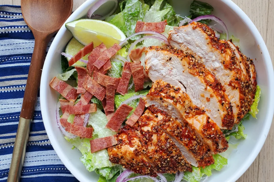 Double caesar salad with turkey breast.