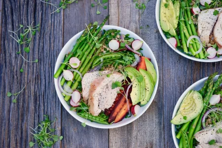 Turkey grain bowl placed on a wooden table.