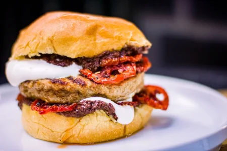 Butterball turkey burger placed on a white plate.