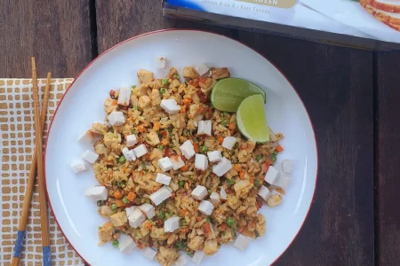 Shahir-Fried-Rice-Leftovers-scaled-e1634215288968 Leftover turkey fried rice placed in a plate.