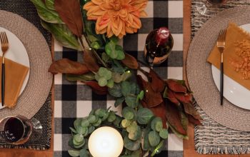 Top view of holiday dinner table by candlelight