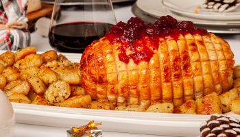 Roast turkey with red wine and cranberry sauce served with ricotta gnocchi pan Roast turkey with red wine and cranberry sauce served with ricotta gnocchi pan